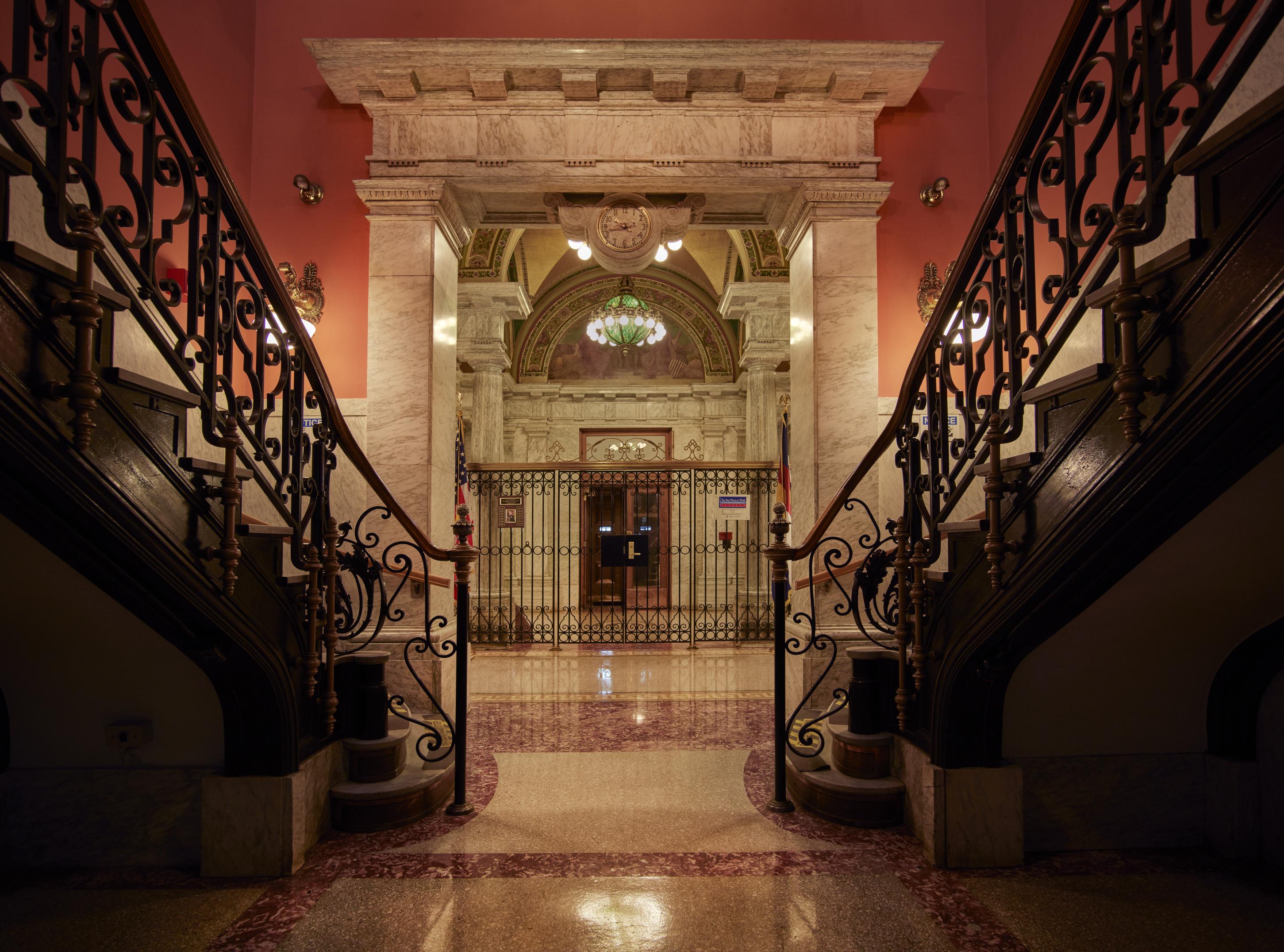 Historic Denver Mint interior photographed by Carol M. Highsmith in 2016, with marble arches, railings and a wall clock
