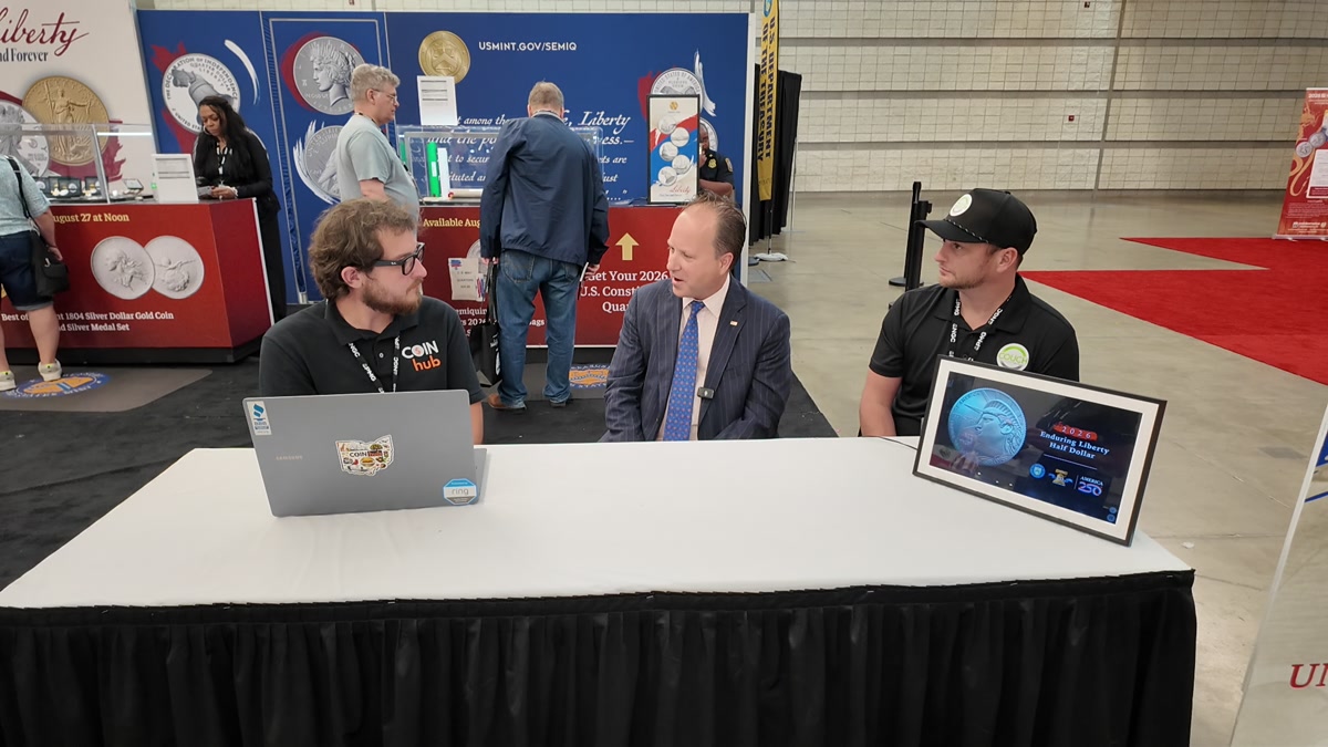 Blake Alma, U.S. Mint Director Paul Hollis and Justin Couch seated together during the CoinHub interview