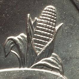 Close-up of the 2004-D Wisconsin quarter extra leaf high variety near the corn stalk
